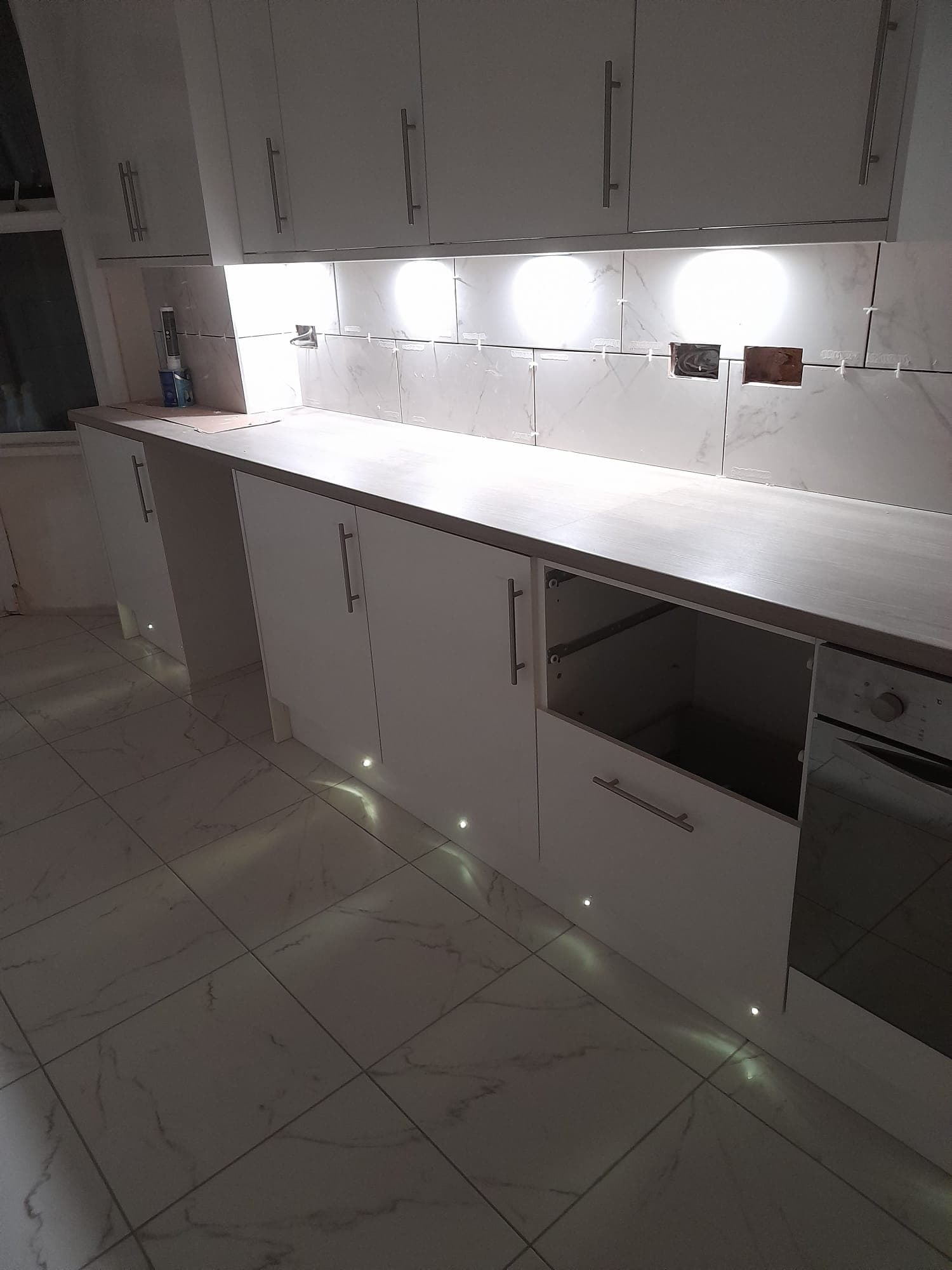 Modern Kitchen Refurbishment with Porcelain Tiling & LED Lighting Upgrade cover